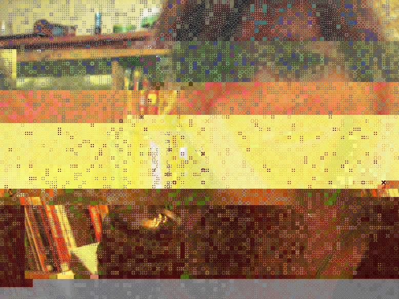 Some yellow glitch artwork of an obscured portrait